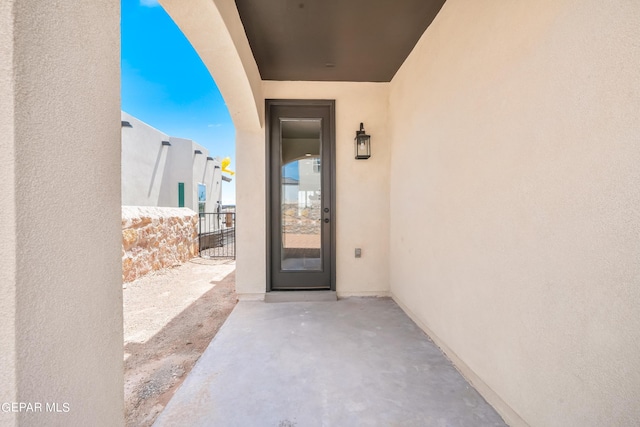 921 Raegil St, El Paso, TX 79928 - entrance to property with stucco siding and a patio area