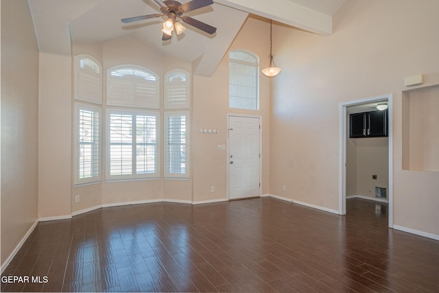 527 Longleaf Pl, El Paso, TX 79928 - unfurnished living room with a ceiling fan, dark wood-style floors, and high vaulted ceiling