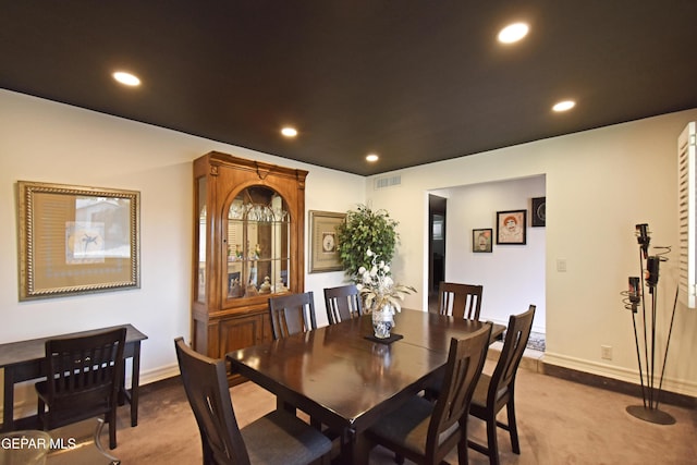 dining space featuring carpet, baseboards, visible vents, and recessed lighting