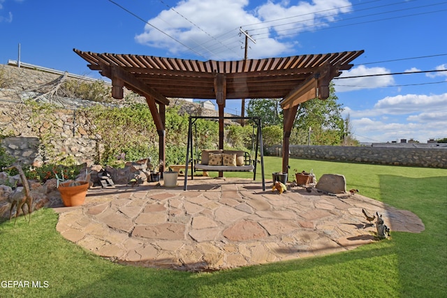 view of patio featuring a pergola and fence