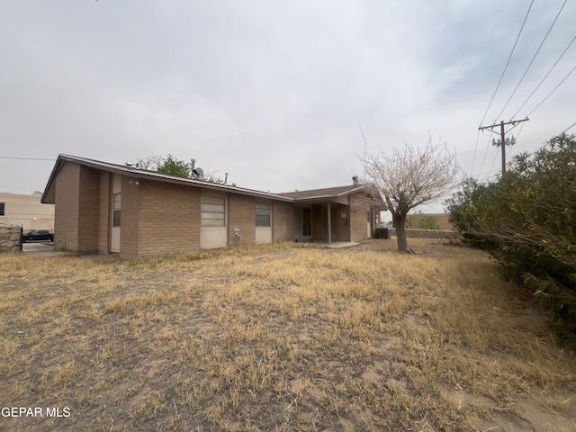 5310 Blanco Ave Unit 5310-5314, El Paso, TX 79905 - rear view of property featuring brick siding
