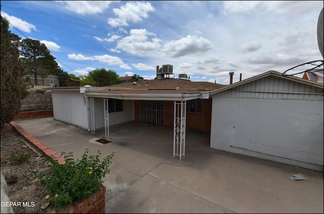 rear view of house with a patio area
