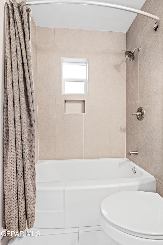 full bathroom with toilet and shower / bath combo