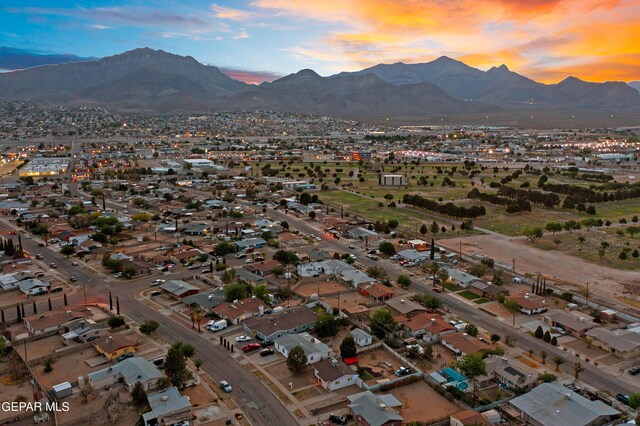 drone / aerial view with a mountain view and a residential view