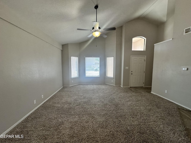 unfurnished living room with high vaulted ceiling, ceiling fan, carpet, and baseboards
