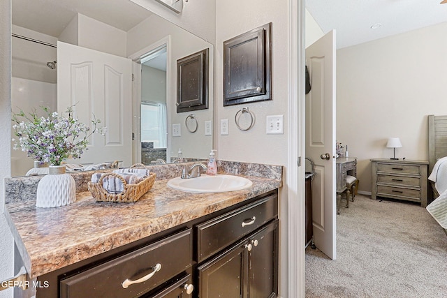 bathroom with ensuite bath and vanity