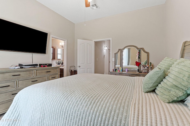 bedroom featuring visible vents and ensuite bath