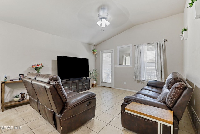 living room featuring visible vents, light tile patterned flooring, baseboards, a ceiling fan, and vaulted ceiling