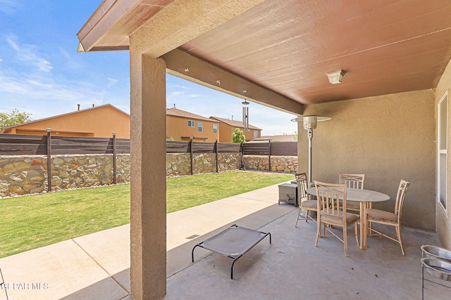 view of patio / terrace with outdoor dining area and a fenced backyard