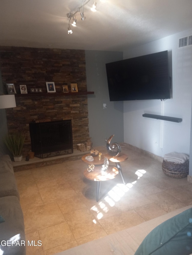 living area featuring a fireplace
