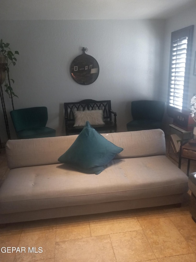 living area with light tile patterned flooring