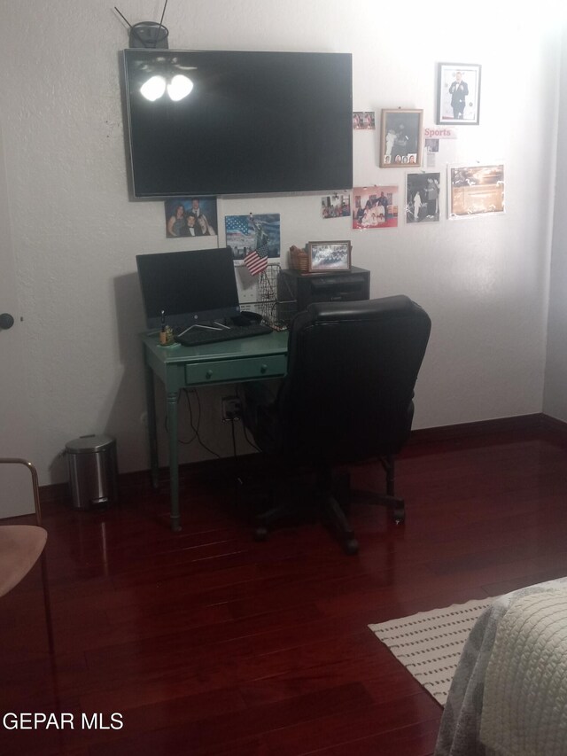 home office featuring wood finished floors