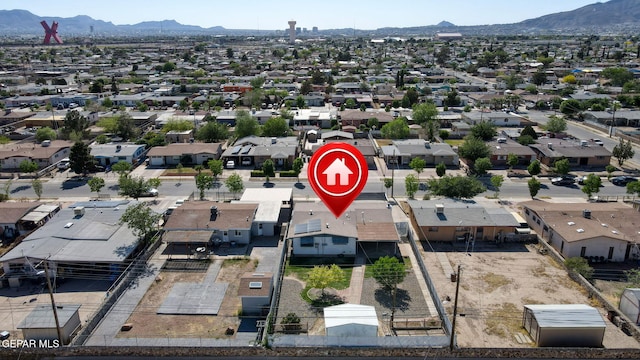 bird's eye view featuring a residential view and a mountain view