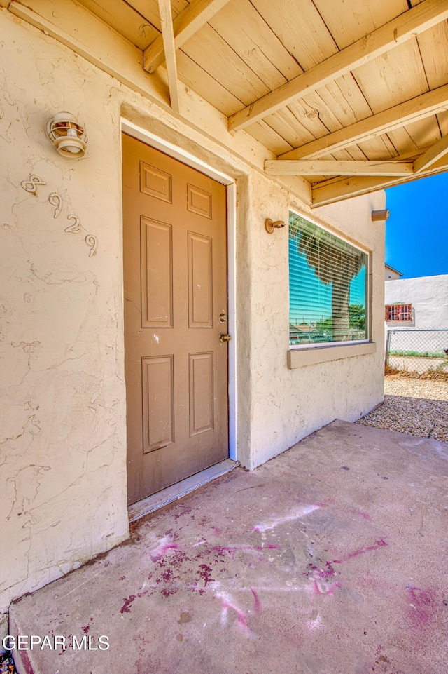 8929 Robert Dr Unit 1 & 2, El Paso, TX 79904 - entrance to property with fence, a patio area, and stucco siding