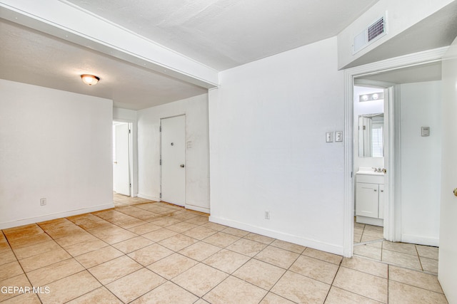 8929 Robert Dr Unit 1 & 2, El Paso, TX 79904 - unfurnished room featuring light tile patterned floors, baseboards, and visible vents