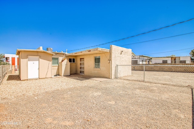 8929 Robert Dr Unit 1 & 2, El Paso, TX 79904 - back of property with a fenced backyard and stucco siding