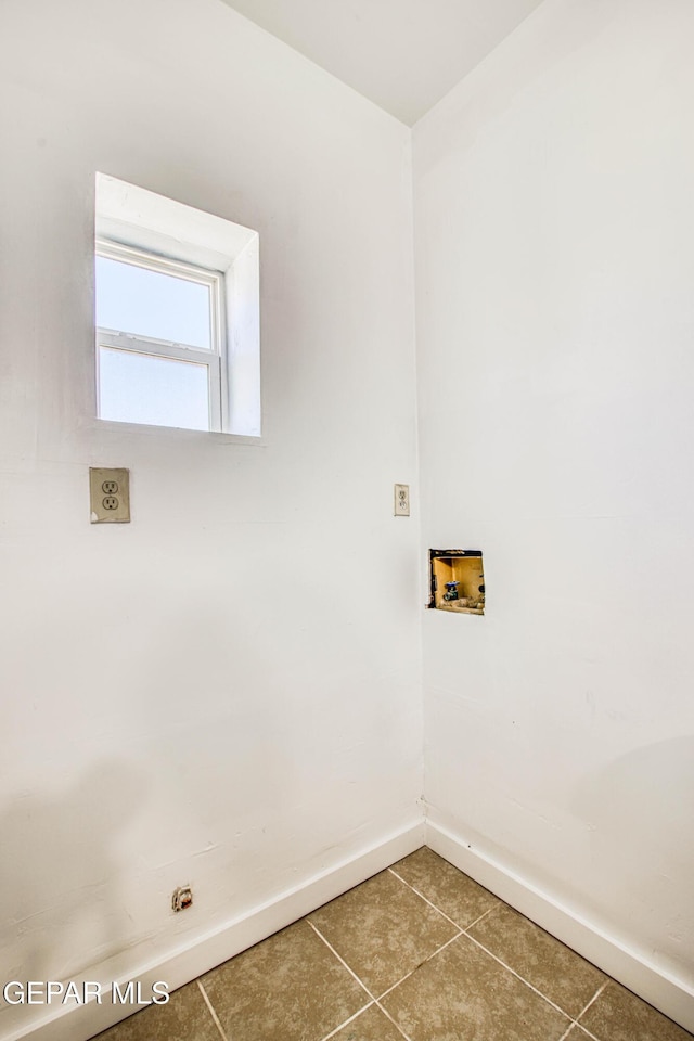8929 Robert Dr Unit 1 & 2, El Paso, TX 79904 - washroom with baseboards, laundry area, washer hookup, and tile patterned floors