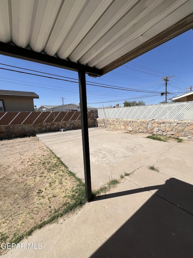 view of yard featuring a patio and a fenced backyard