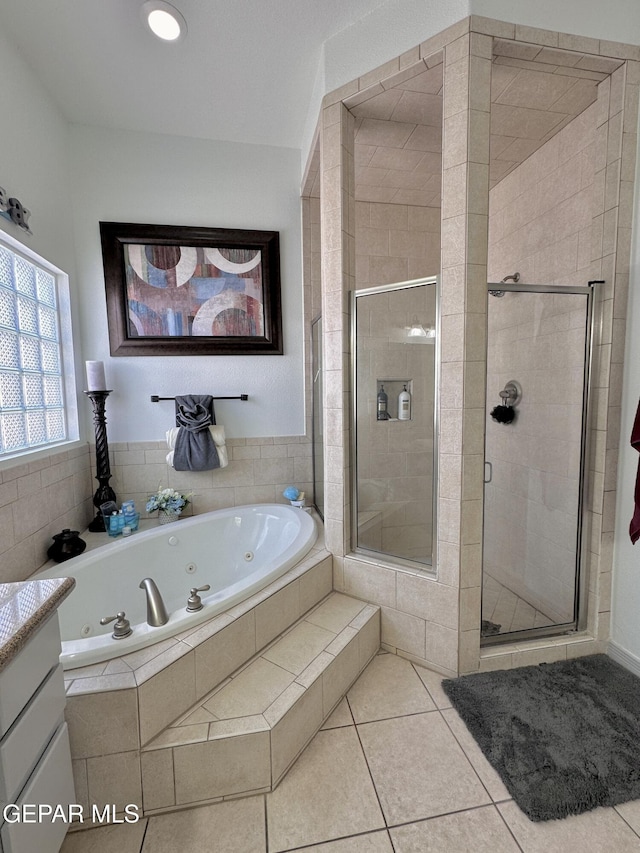 1363 Golden Trail Ln, El Paso, TX 79936 - bathroom with a shower stall, a jetted tub, and tile patterned floors