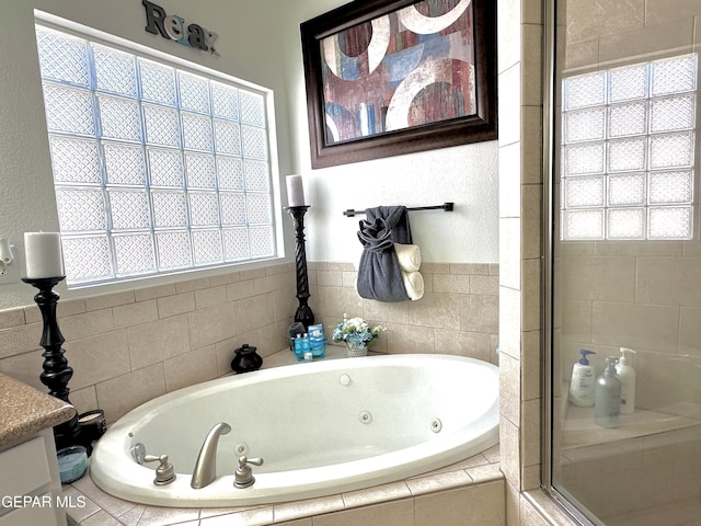 1363 Golden Trail Ln, El Paso, TX 79936 - full bathroom featuring a stall shower and a whirlpool tub