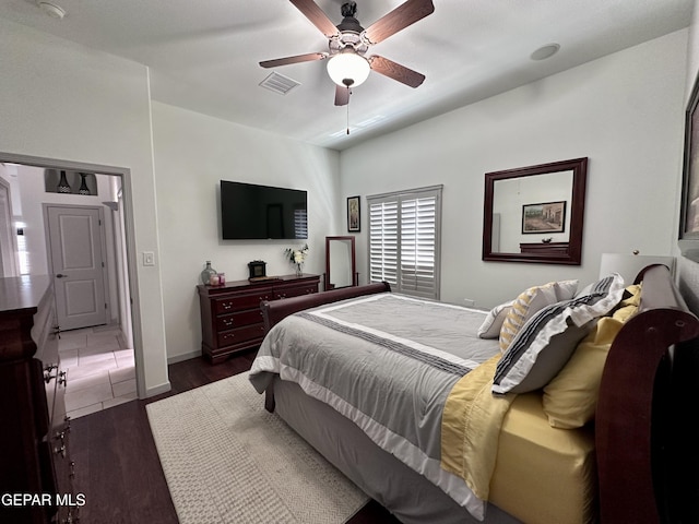 1363 Golden Trail Ln, El Paso, TX 79936 - bedroom with wood finished floors, ceiling fan, and baseboards