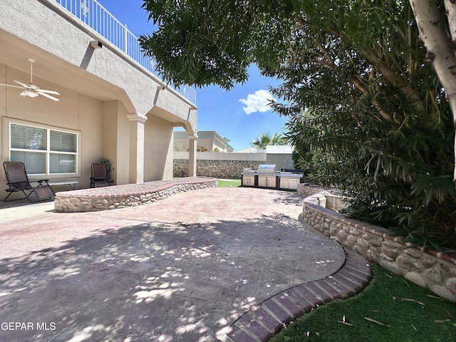 1363 Golden Trail Ln, El Paso, TX 79936 - view of patio / terrace with an outdoor kitchen, a ceiling fan, and fence