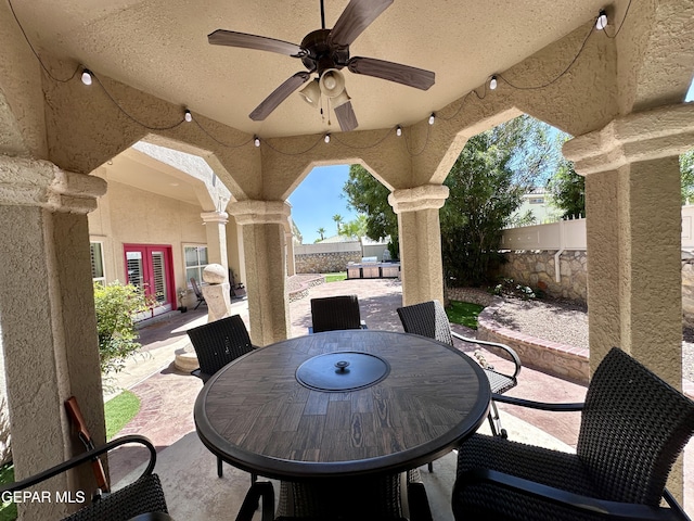 1363 Golden Trail Ln, El Paso, TX 79936 - view of patio / terrace featuring a fenced backyard, french doors, a ceiling fan, and outdoor dining area
