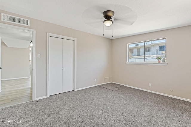 7113 Pear Tree Ln, El Paso, TX 79915 - unfurnished bedroom with carpet flooring, a closet, baseboards, and ceiling fan