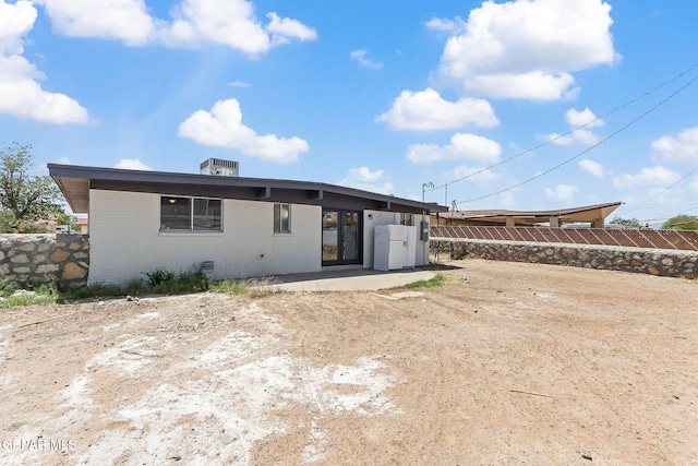 7113 Pear Tree Ln, El Paso, TX 79915 - rear view of property with brick siding