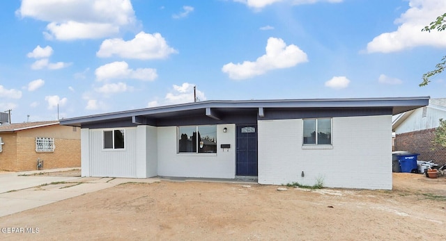 7113 Pear Tree Ln, El Paso, TX 79915 - mid-century modern home featuring brick siding