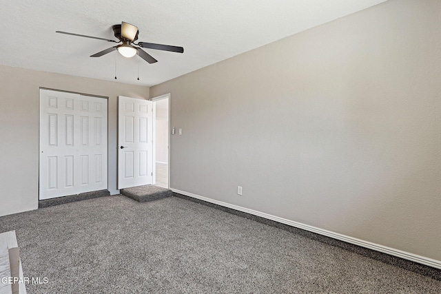 7113 Pear Tree Ln, El Paso, TX 79915 - unfurnished bedroom featuring dark colored carpet, a closet, baseboards, and ceiling fan