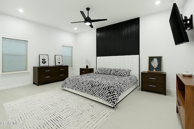 bedroom featuring recessed lighting, baseboards, and light colored carpet
