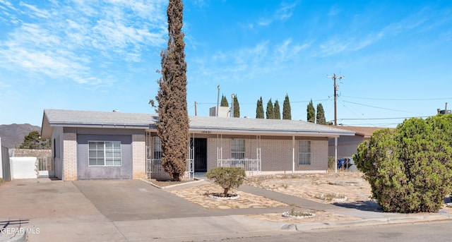 10601 Teresa Pl, El Paso, TX 79924 - ranch-style house featuring brick siding and covered porch