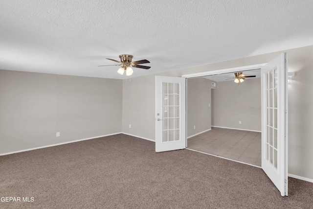 10601 Teresa Pl, El Paso, TX 79924 - carpeted spare room with french doors, ceiling fan, a textured ceiling, baseboards, and tile patterned flooring