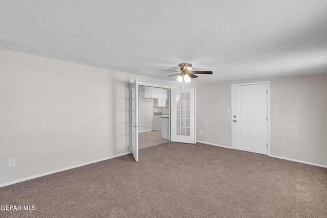 10601 Teresa Pl, El Paso, TX 79924 - unfurnished living room with french doors, carpet flooring, ceiling fan, a textured ceiling, and baseboards