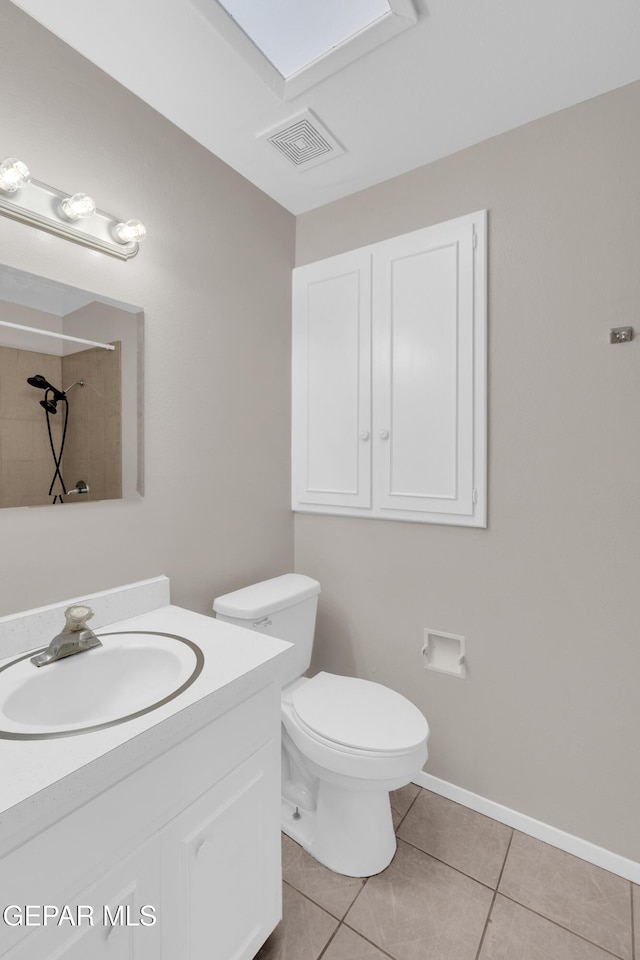 10601 Teresa Pl, El Paso, TX 79924 - bathroom with tile patterned floors, vanity, toilet, and a tile shower