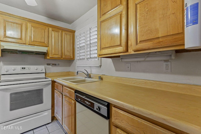 4800 N Stanton St Unit 87, El Paso, TX 79902 - kitchen with under cabinet range hood, light tile patterned floors, white appliances, a sink, and light countertops