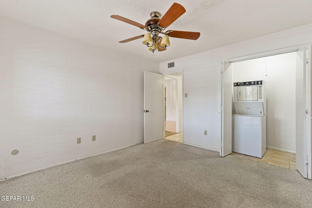 4800 N Stanton St Unit 87, El Paso, TX 79902 - unfurnished bedroom featuring washer / clothes dryer, carpet, ceiling fan, and visible vents