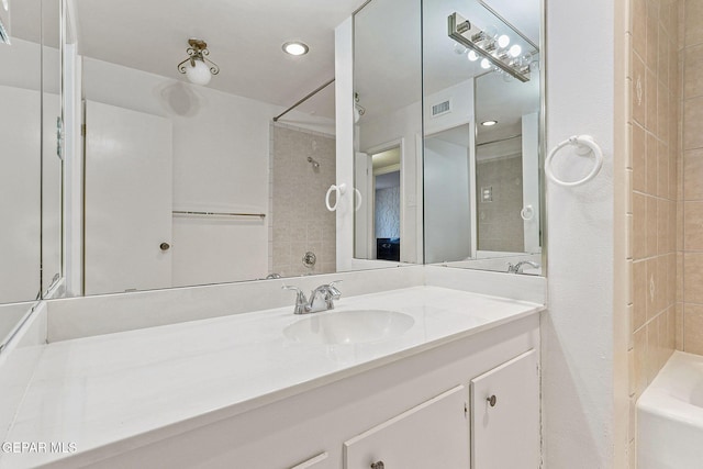 4800 N Stanton St Unit 87, El Paso, TX 79902 - bathroom with visible vents, vanity, and recessed lighting