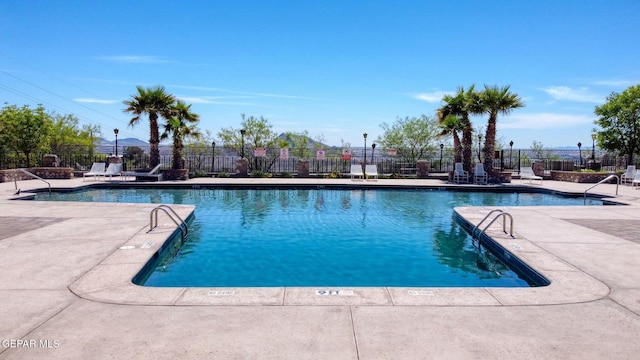 4800 N Stanton St Unit 87, El Paso, TX 79902 - pool featuring fence and a patio area