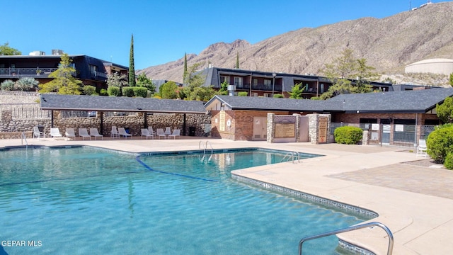 4800 N Stanton St Unit 87, El Paso, TX 79902 - pool featuring a mountain view, a patio, and fence