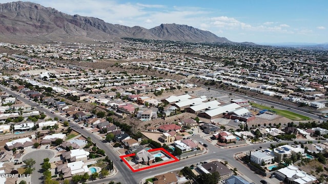 drone / aerial view with a mountain view and a residential view
