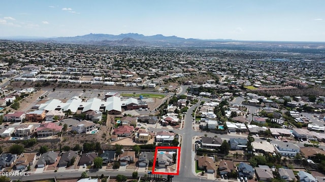 bird's eye view with a residential view and a mountain view
