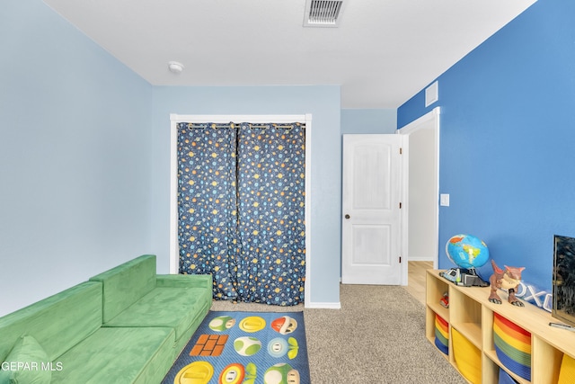 playroom featuring visible vents, baseboards, and carpet floors