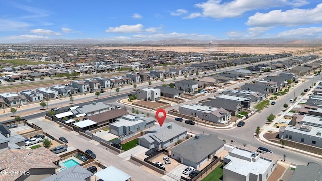 bird's eye view featuring a residential view and a mountain view