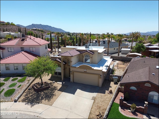 bird's eye view with a mountain view and a residential view