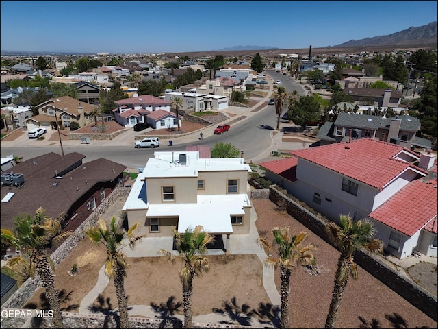 drone / aerial view with a residential view and a mountain view