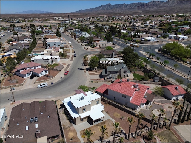 aerial view with a mountain view and a residential view