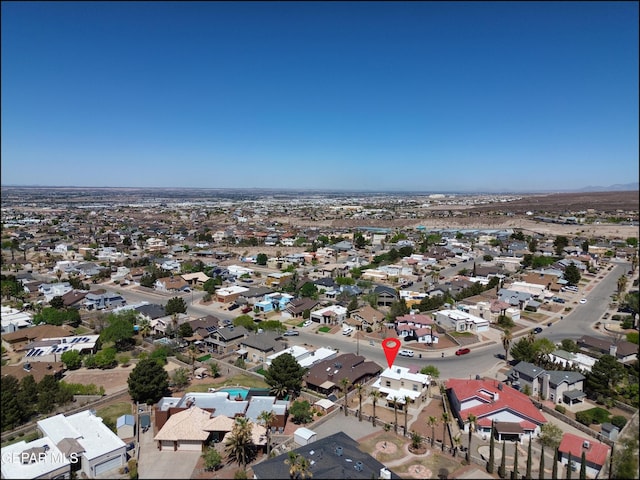 birds eye view of property with a residential view