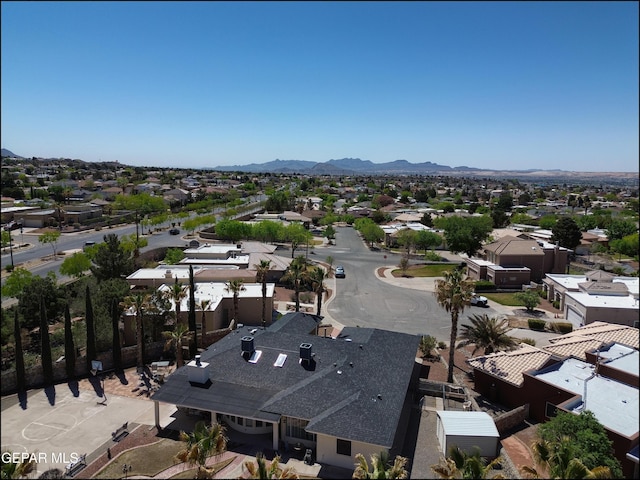 birds eye view of property featuring a mountain view and a residential view